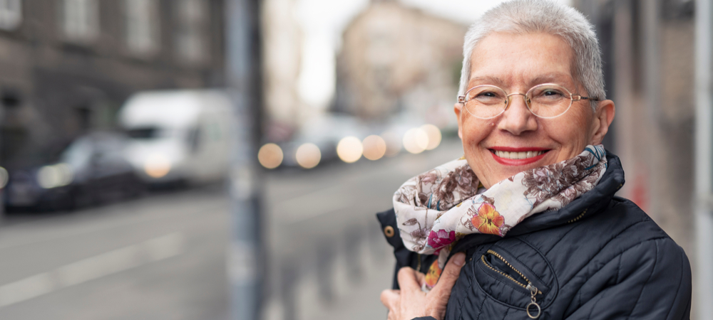 older lady short hair glasses